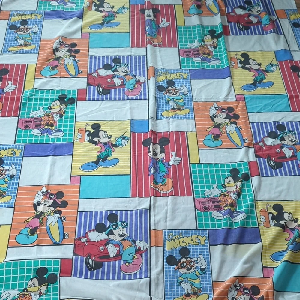 Vintage Disney Mickey mouse themed twin size sheet.